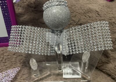 Glittery ornament with silver rhinestone embellishments.